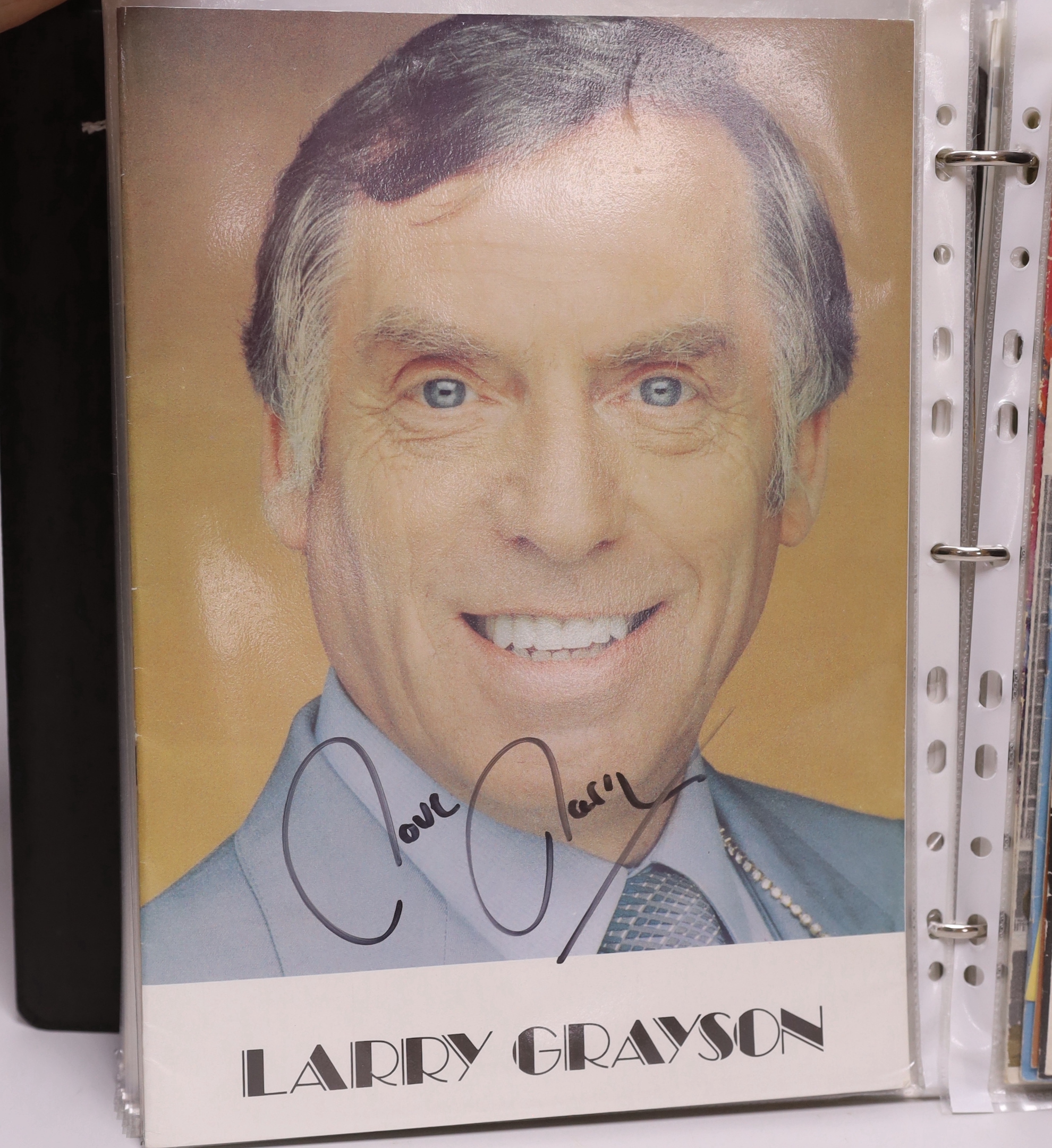 An album of photos of movie and TV stars and Royal family, and ephemera including autographs